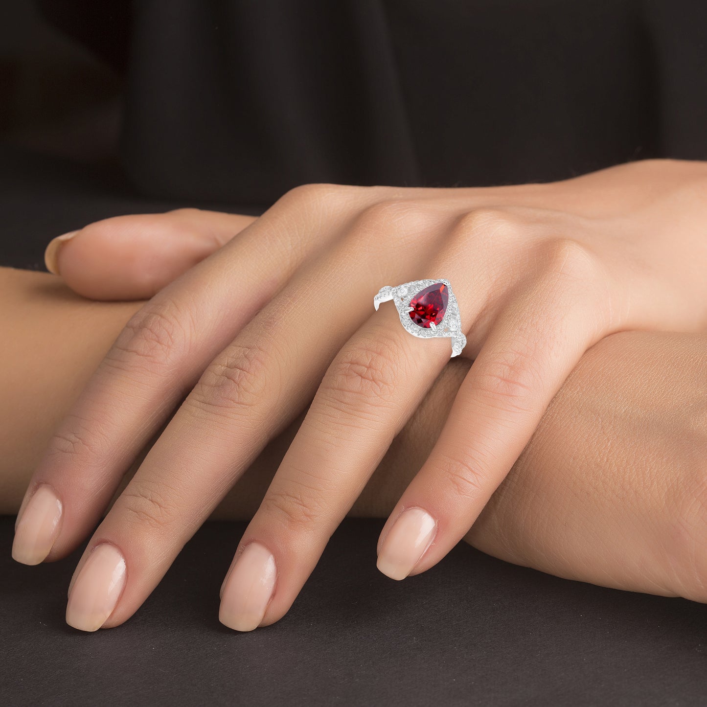 Silver 925 Rhodium Plated Ruby Cubic Zirconia Center Stone Tear Shape Ring. BR14177RED